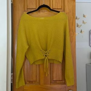 Oval neck bottom tie up cropped sweatshirt. Size L. Worn once, great condition!